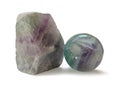 Polished and rough natural specimens of Fluorite banded crystal Royalty Free Stock Photo