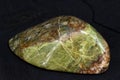 A polished sample of unakite granite with epidote Royalty Free Stock Photo