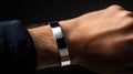 Polished Silver Cuff Bracelet on a Man\'s Wrist, Elegant and Modern Jewelry for Sophisticated Style Enthusiasts