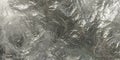 Polished silver metal dark grey stone texture background. Italian marble slab with veins. Closeup surface grunge rock texture Royalty Free Stock Photo