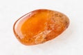 polished Spessartine garnet gemstone on white Royalty Free Stock Photo