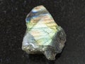 polished surface of labradorite stone on dark Royalty Free Stock Photo