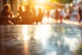 polished table, blurred patrons in sunlit cafe scene behind