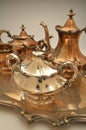 Polished and tarnished pieces of a silver tea set Royalty Free Stock Photo