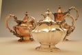 Polished and tarnished pieces of a silver tea set Royalty Free Stock Photo