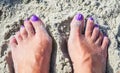 Feet and Toes in the Sand on a Beach Royalty Free Stock Photo