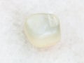 polished translucent moonstone gemstone on white