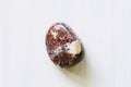 Polished tumbled stone leopard jasper on a white background