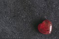 Watermelon quartz stone heart on a black background Royalty Free Stock Photo