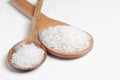 Polished white rice in wooden spoon