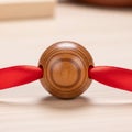 Wood s texture appears smooth and the ribbon is glossy providing Royalty Free Stock Photo