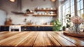 Polished Wooden Table with Defocused Modern Kitchen Background Royalty Free Stock Photo