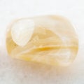 polished yellow banded Agate gemstone on white Royalty Free Stock Photo