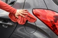 Polishing a car after the car wash