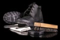Polishing and cleaning leather shoes with a brush. Cleaning work shoes. Royalty Free Stock Photo