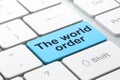 Political concept: The World Order on computer keyboard background