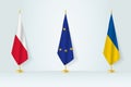 Political gathering of governments. Flags of Poland, European Union and Ukraine