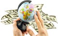 Political globe on the background of US dollars