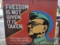 Political graffiti painted on the street wall with Netaji Subhas Chandra Bose and his message on Indian Freedom struggle