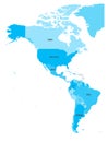 Political map of Americas in four shades of blue on white background. North and South America with country labels