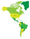 Political map of Americas in four shades of green on white background. North and South America with country labels Royalty Free Stock Photo