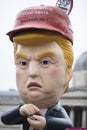 A political satire sculpture of Donald Trump at an anti Trump March in London