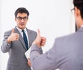 Politician planning speach in front of mirror