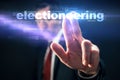 Politician pushing virtual screen interface with word Electioneering Royalty Free Stock Photo