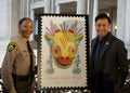 Politicians and City leaders posing for a group photo after the unveiling of the commemorative Lunar New Year Stamp