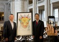 Politicians and City leaders posing for a group photo after the unveiling of the commemorative Lunar New Year Stamp