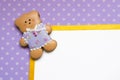 Polka-dot background with a honey-cake bear