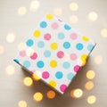 Polka dot gift box with lights Royalty Free Stock Photo