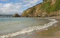 Cliffs at Polkerris Beach, Cornwall, England Royalty Free Stock Photo