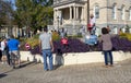 A poll worker talks with voters waiting to cast their votes at City Hall in Athens Georgia.