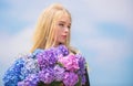 Pollen allergy. Gentle flower for delicate woman. Girl tender blonde hold hydrangea flowers bouquet. Allergy free life Royalty Free Stock Photo