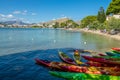 View of the bay of PollenÃ§a (Spain) with some colored kayaks in the foreground Royalty Free Stock Photo