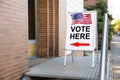 Polling Place Vote Here Sign On Board Royalty Free Stock Photo