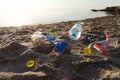 Polluted Beach With Plastic Trash And Single-Use Bottles Near Sea Royalty Free Stock Photo