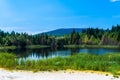 Polluted lake with kaolin on abandoned quarry with beautiful blue sky