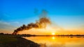 Pollution in the air after farmers burned the sugar cane trees Royalty Free Stock Photo