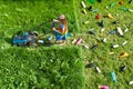 Pollution concept with little girl and plastic litter Royalty Free Stock Photo