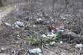 Pollution of the environment with plastic garbage in the forests and fields is a serious ecological problem Royalty Free Stock Photo