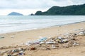Garbages, plastic, and wastes on the beach Royalty Free Stock Photo
