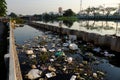 Pollution river from litter at Ho Chi Minh city, Viet Nam, trash from plastic bag, bottle, packaging in water