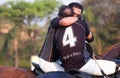 Polo players commemorating the triumph Royalty Free Stock Photo
