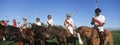 Polo Players And Umpire On Horses