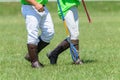 Polocrosse Players Closeup Walking Boots Rackets