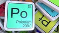 Polonium Po block on the pile of periodic table of the chemical elements blocks. 3D rendering