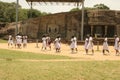 Polonnaruwa Sri Lanka Ancient ruins school children visiting statues of Buddha