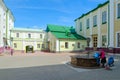 People are at ancient well in courtyard of Polotsk State University
